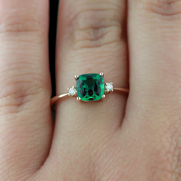 Custom MiaDonna three stone engagement ring emerald